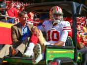 Sep 23, 2018; Kansas City, MO, USA; San Francisco 49ers quarterback Jimmy Garoppolo (10) is taken off the field after an injury in the second half against the Kansas City Chiefs at Arrowhead Stadium. Mandatory Credit: Jay Biggerstaff-USA TODAY Sports