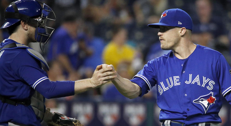 Danny Jansen is off to a strong start to his MLB career. (Charlie Riedel/AP)