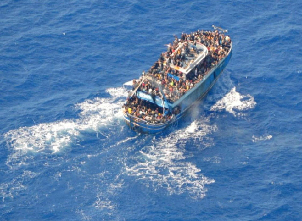 A undated handout photo provided by the Hellenic Coast Guard shows migrants onboard a boat during a rescue operation, before their boat capsized on the open sea, off Greece, June 14, 2023. / Credit: HELLENIC COAST GUARD / REUTERS