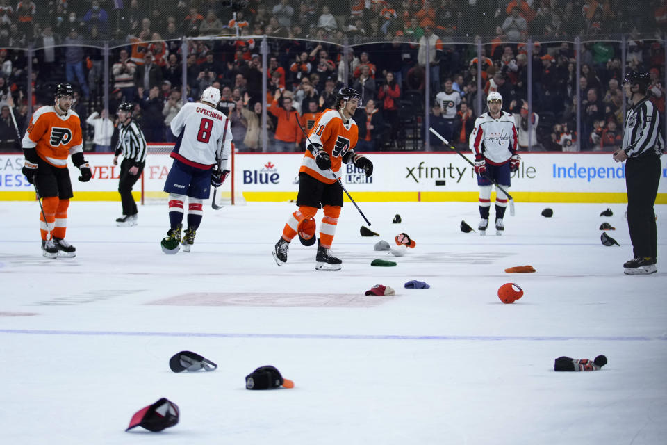 Philadelphia Flyers' Travis Konecny reacts after scoring his third goal during an NHL hockey game against the Washington Capitals, Wednesday, Jan. 11, 2023, in Philadelphia. (AP Photo/Matt Slocum)