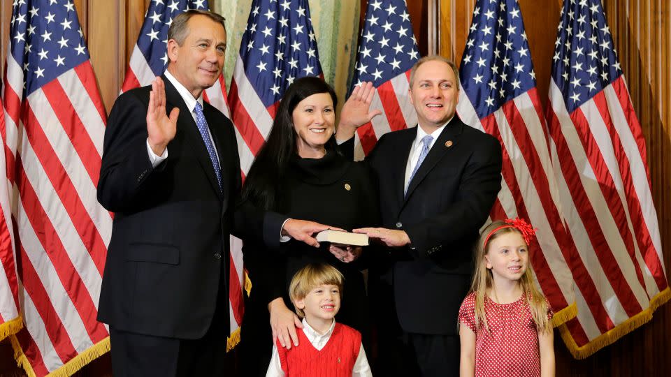 Rep. Steve Scalise stands with his family with Speaker of the House John Boehner in January 2013, in Washington.  - J. Scott Applewhite/AP
