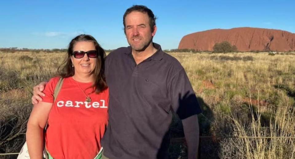 Missing Queensland woman Julie Schutt with husband Clifford at Ayres Rock