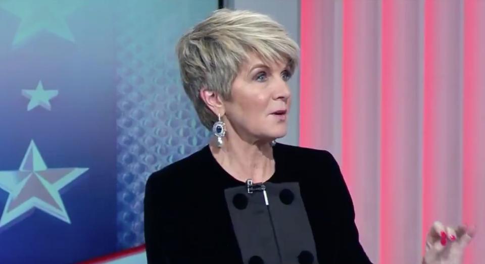 Pictured here Julie Bishop looks back at Labor deputy leader Tanya Plibersek with a cheeky response during live election coverage on Channel Nine.