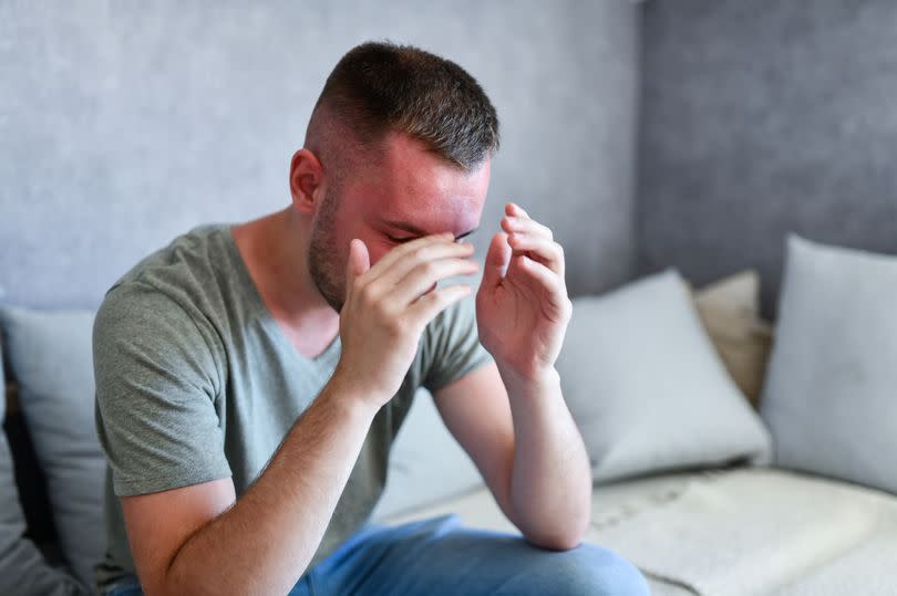 Male Experiencing Heat Stroke On A Hot Sunny Day