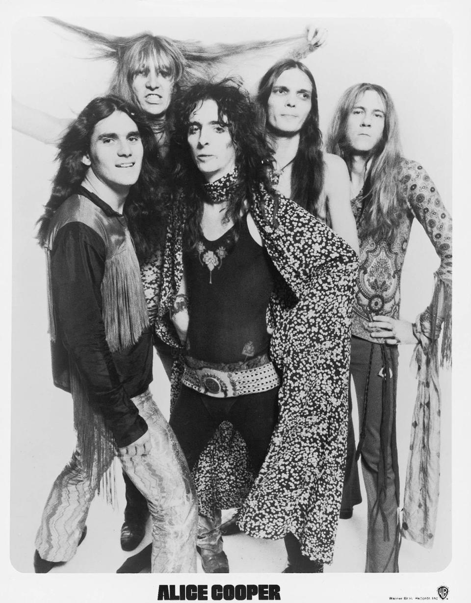 The Alice Cooper group featuring, from left, Michael Bruce, Neal Smith, Alice Cooper, Dennis Dunaway and Glen Buxton, takes a publicity photo in the early 1970s. Smith and Buxton were from Akron.