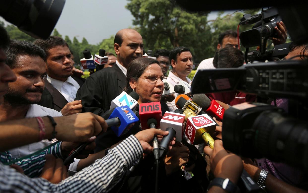 Farha Faiz, a Supreme Court lawyer, speaks to members of the media after the court declared 'Triple Talaq' unconstitutional in its verdict in New Delhi - AP