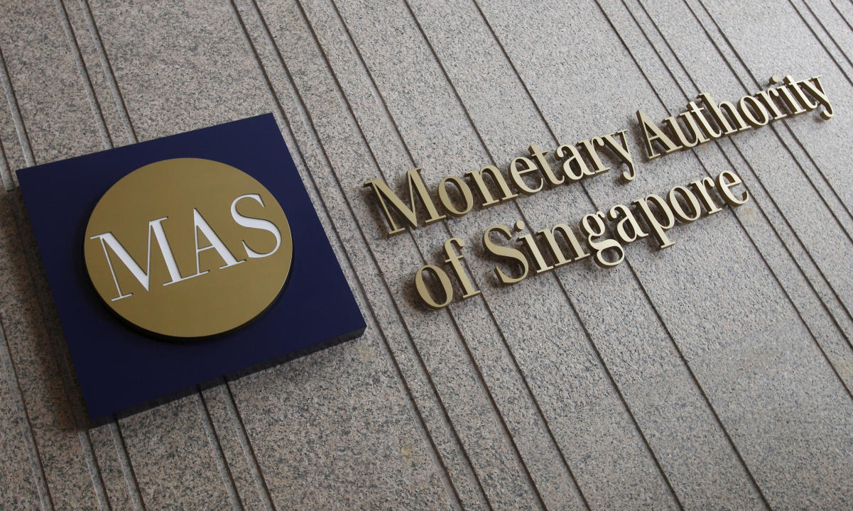 The logo of the Monetary Authority of Singapore (MAS) is pictured at its building in Singapore in this February 21, 2013 file photo.  REUTERS/Edgar Su/File Photo