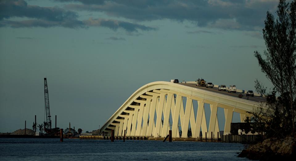 Work continues on the Sanibel Causeway on Thursday, Jan. 19, 2023. The chain of spoil islands that connects Fort Myers to Sanibel and Captiva was damaged in Hurricane Ian.  