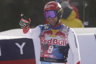 Switzerland's Beat Feuz gets to the finish area after completing an alpine ski, men's World Cup downhill, in Kitzbuehel, Austria, Sunday, Jan. 24, 2021. (AP Photo/Giovanni Auletta)