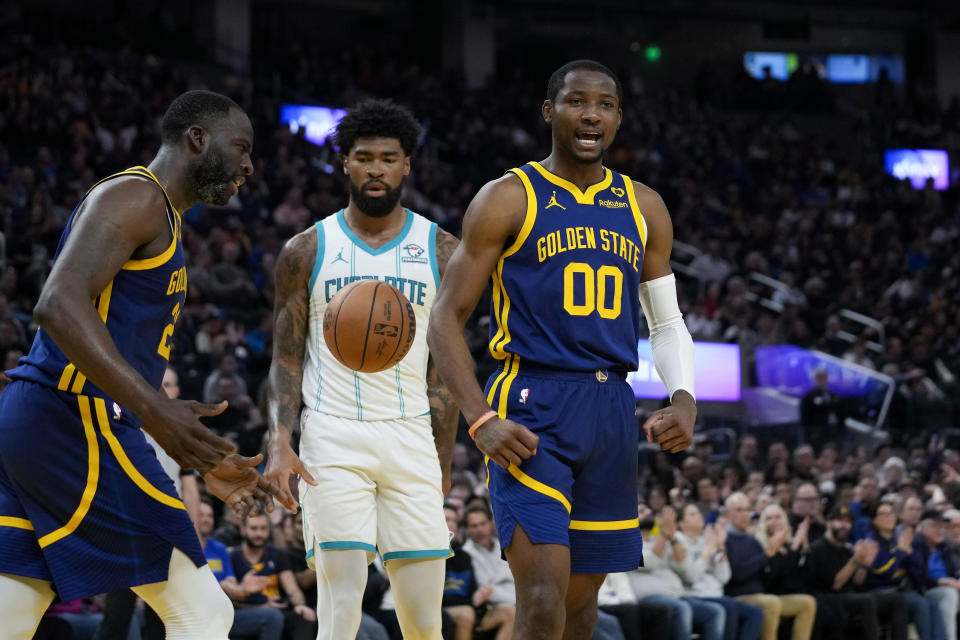 Golden State Warriors forward Jonathan Kuminga (00) reacts during the first half of the team's NBA basketball game against the Charlotte Hornets, Friday, Feb. 23, 2024, in San Francisco. (AP Photo/Godofredo A. Vásquez)
