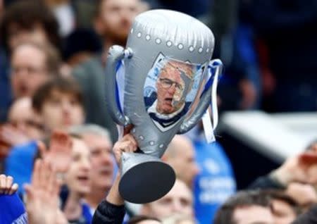 Britain Football Soccer - Manchester United v Leicester City - Barclays Premier League - Old Trafford - 1/5/16 General view of Leicester City fans with an inflatable trophy featuring Claudio Ranieri Reuters / Darren Staples Livepic