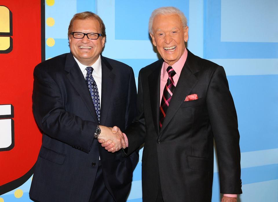 Drew Carey shaking Bob Barker's hand