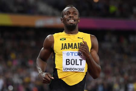 Aug 5, 2017; London, United Kingdom; Usain Bolt (JAM) reacts after placing third in the 100m in 9.95 in his last individual race of his career during the IAAF World Championships in Athletics at London Stadium at Queen Elizabeth Park. Mandatory Credit: Kirby Lee-USA TODAY Sports