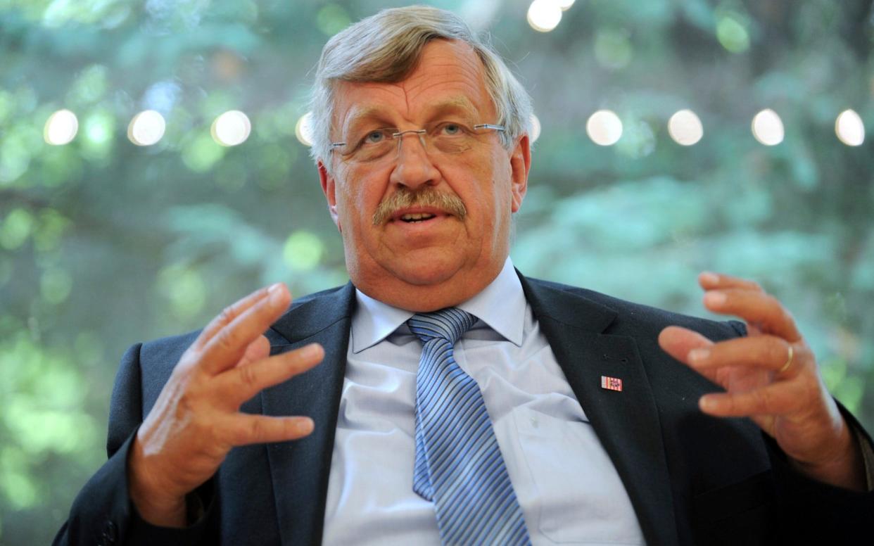 Walter Lübcke who was in charge of the Kassel area regional administration, talks to media in Kassel, Germany. Walter Luebcke was found dead outside his home Sunday, June 2, 2019 - DPA