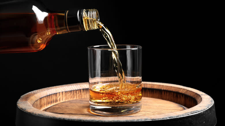 Bourbon being poured into glass