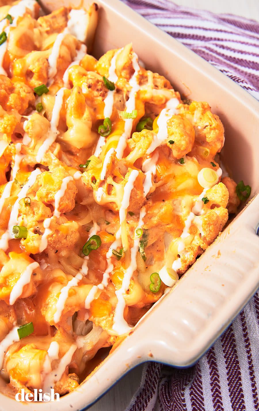 <p>This casserole is like if <a href="https://www.delish.com/cooking/recipe-ideas/recipes/a51133/classic-buffalo-wings-recipe/" rel="nofollow noopener" target="_blank" data-ylk="slk:buffalo chicken wings;elm:context_link;itc:0;sec:content-canvas" class="link ">buffalo chicken wings</a> <em>and</em> <a href="https://www.delish.com/cooking/recipe-ideas/recipes/a49855/cauliflower-wings-recipe/" rel="nofollow noopener" target="_blank" data-ylk="slk:buffalo cauliflower;elm:context_link;itc:0;sec:content-canvas" class="link ">buffalo cauliflower</a> came together—it's a little cheesy and a little spicy, and everyone will love it.</p><p>Get the <strong><a href="https://www.delish.com/cooking/recipe-ideas/recipes/a49035/buffalo-chicken-casserole-recipe/" rel="nofollow noopener" target="_blank" data-ylk="slk:Buffalo Chicken Cauliflower Casserole recipe;elm:context_link;itc:0;sec:content-canvas" class="link ">Buffalo Chicken Cauliflower Casserole recipe</a></strong>.</p>