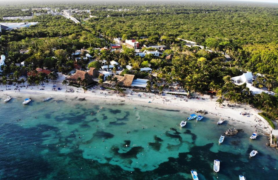 Aerial view of Bahia Akumal beach, in Tulum, Quintana Roo state, Mexico on Dec. 29, 2020. (Photo by RODRIGO ARANGUA / AFP) (Photo by RODRIGO ARANGUA/AFP via Getty Images)