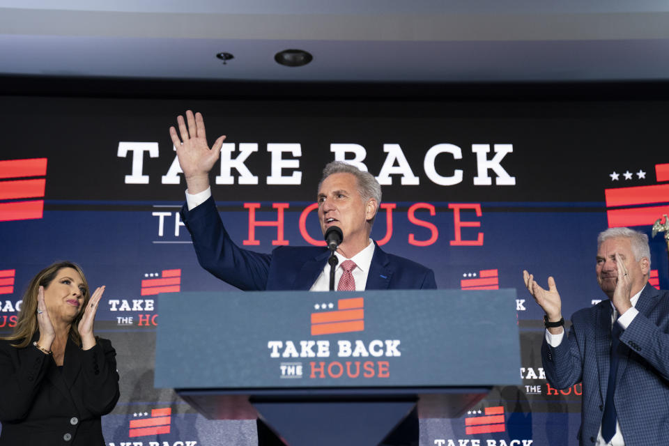 FILE - House Minority Leader Kevin McCarthy of Calif., speaks at an election event, Nov. 9, 2022, in Washington, as Republican National Committee chair Ronna McDaniel, left, and Rep. Tom Emmer, R-Minn., listen. The House will convene Tuesday, Jan. 3, 2023, to elect a speaker for the new Congress. The majority of the Republican conference plans to nominate Kevin McCarthy to lead them as they take over control of the chamber. (AP Photo/Alex Brandon, File)