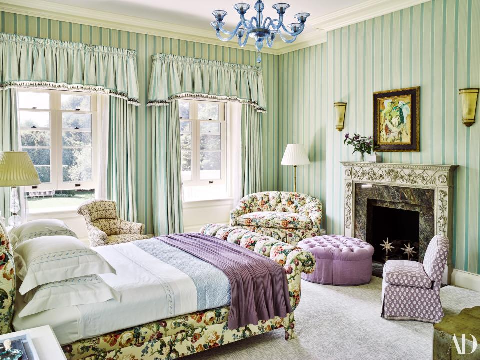 Stripes meet florals in the master bedroom.