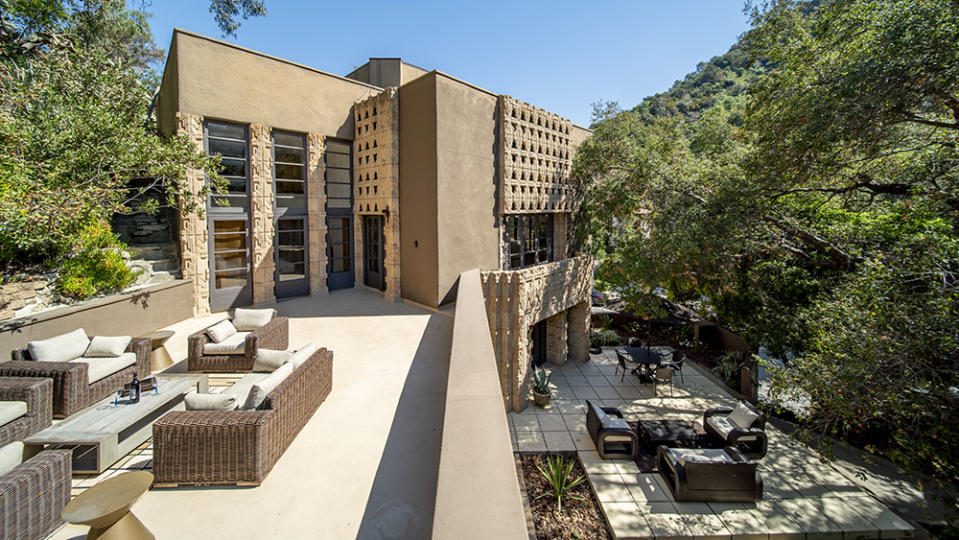 Two different outdoor areas allow for alfresco lounging and dining. - Credit: Open House Foto