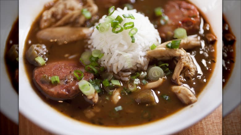 bowl of gumbo with rice topping