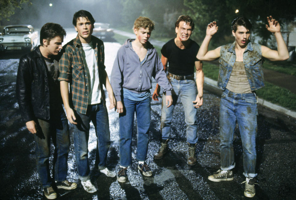 (L-R) Emilio Estevez, Rob Lowe, C. Thomas Howell, Patrick Swayze and Tom Cruise in ‘The Outsiders’