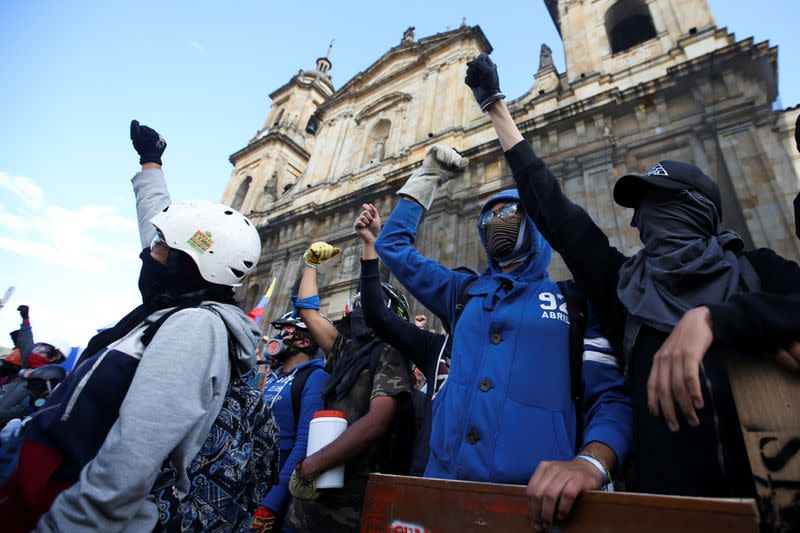 Demonstrators take part in a protest as a national strike continues in Bogota