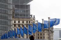 European Union flags flap in the wind at EU headquarters in Brussels, Wednesday, Oct. 9, 2019. Irish Prime Minister Leo Varadkar said that big gaps remain between Britain and the European Union as they try to secure a Brexit deal by next week.(AP Photo/Virginia Mayo)