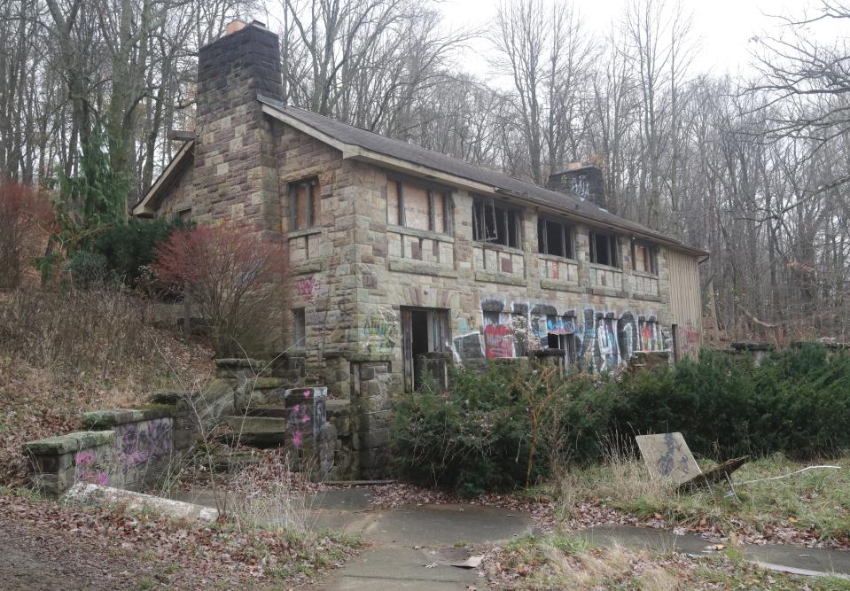 The Heisman Lodge, a former shelter house plagued by vandalism, will be torn down along with the Akron Rubber Bowl.