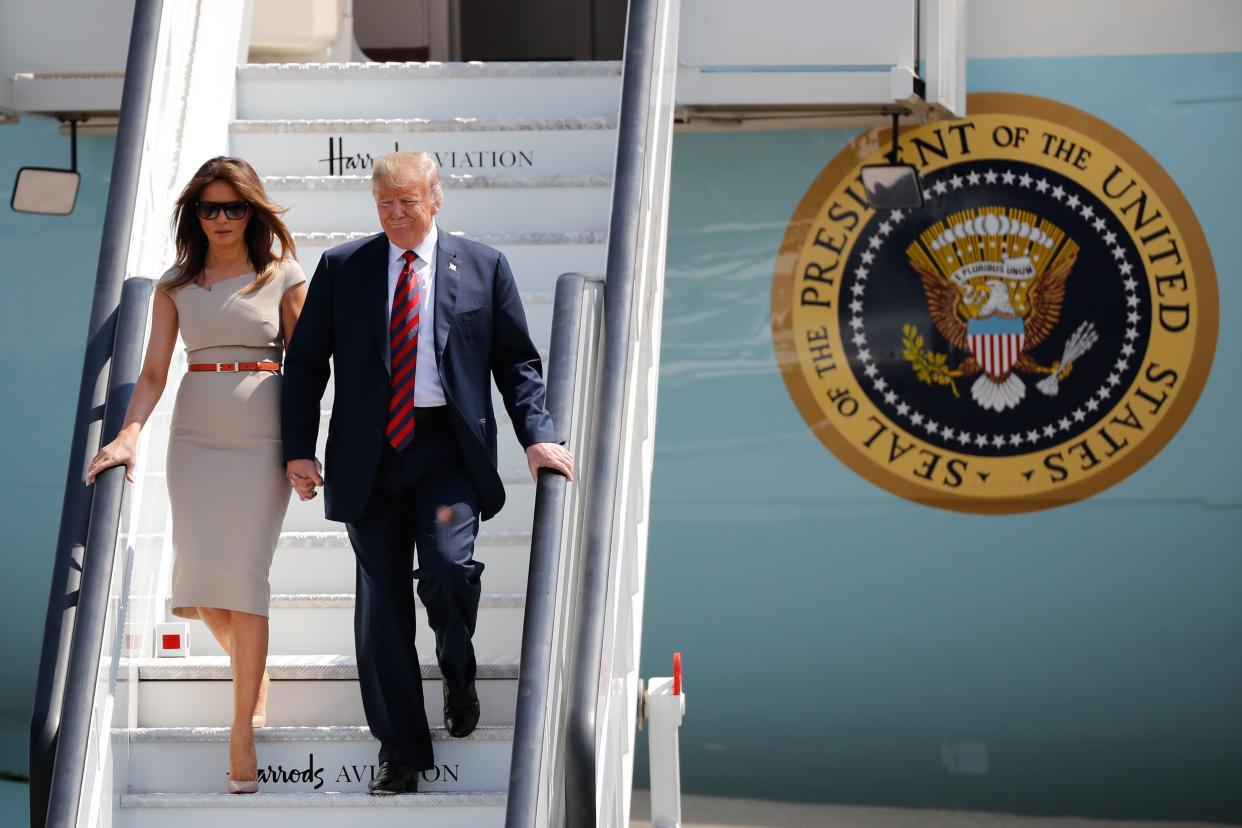 Melania Trump wore a taupe Roland Mouret and yet another pair of Louboutins. (Photo: Tolga Akmen/AFP/Getty Images)