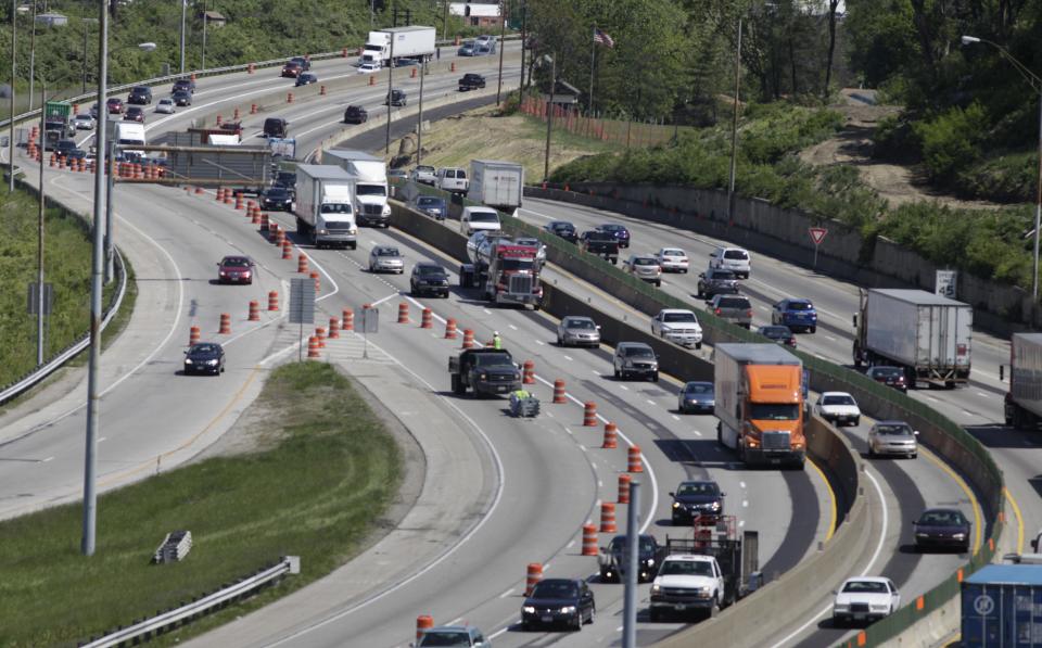 Orange construction barrels sprout along Interstate 75 by the Mitchell Avenue interchange looking north in 2012.