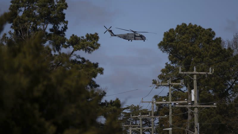 A U.S. Navy CH-53 Super Stallion helicopter flies near Naval Air Station Oceana, Tuesday, February 8, 2024, in Virginia Beach, Virginia. A Marine Corps helicopter, like the one pictured, that had been missing with five troops aboard as an historic storm continued drenching California was found Wednesday morning, Feb. 7, 2024, in a mountainous area outside San Diego. 