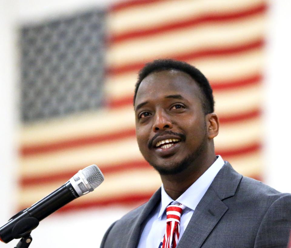 Keynote speaker Abdi Nor Iftin, author of "Call Me American," shares stories during a naturalization ceremony held at Middle School of the Kennebunks May 3, 2024.
