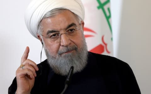 Iranian president Hassan Rouhanihas come under increasing pressure from hardline opponents over his handling of the economic crisis - Credit: Lisi Niesner/Reuters