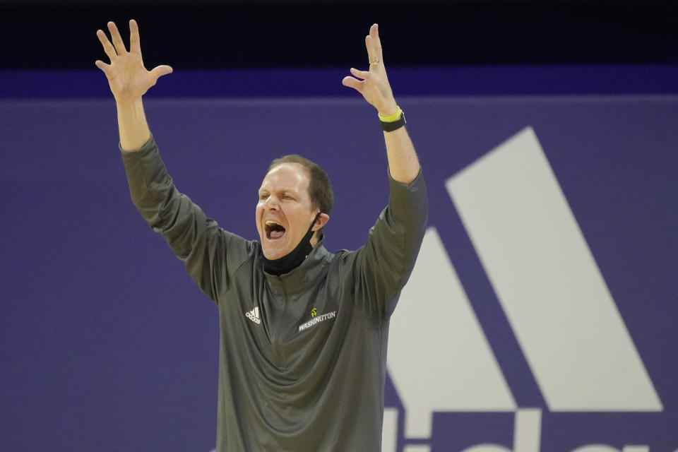 Washington head coach Mike Hopkins reacts near the bench during the first half of an NCAA college basketball game against Utah, Sunday, Jan. 24, 2021, in Seattle. (AP Photo/Ted S. Warren)
