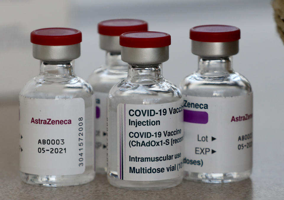 FILE - In this file photo dated Friday, Feb. 5, 2021, vials AstraZeneca vaccine ready to be used at the Wellcome Centre in London. Regulators in the U.K. and four other countries said Thursday March 4, 2021, they plan to fast-track the development and authorisation of modified COVID-19 vaccines to ensure drugmakers are able to move swiftly in targeting emerging variants of the coronavirus disease. (AP Photo/Frank Augstein, FILE)