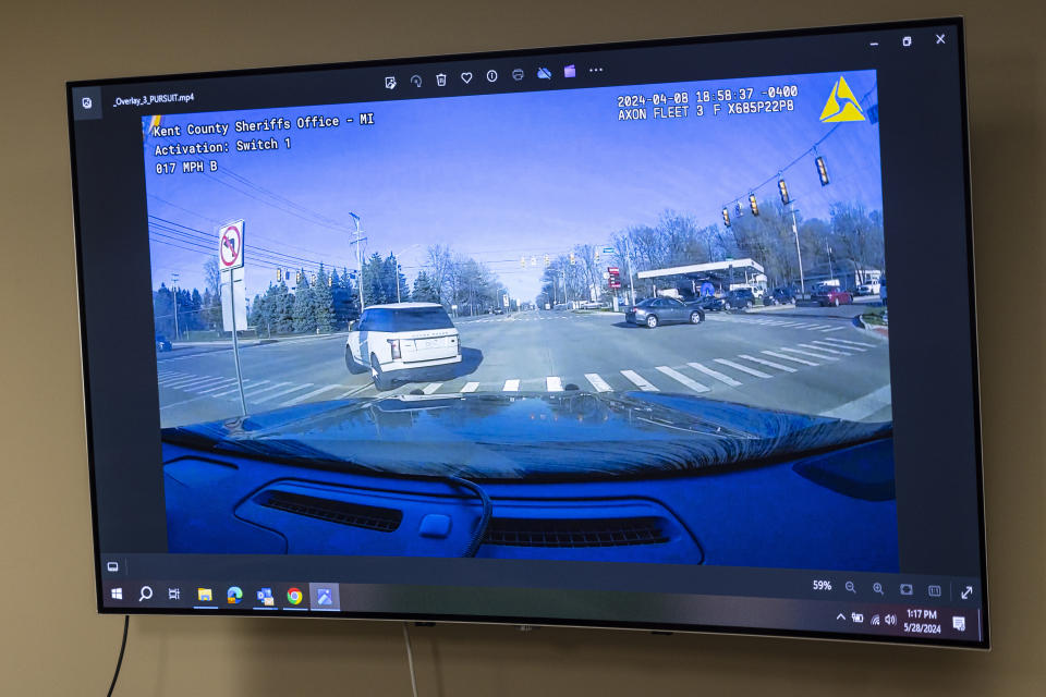 Dashcam footage is shown to the media from the death of Riley Doggett, 17, Tuesday, May 28, 2024, in Grand Rapids, Mich. Doggett was killed by a Kent County patrol vehicle on April 8, 2024, in Wyoming, Michigan. (Joel Bissell/Kalamazoo Gazette via AP)