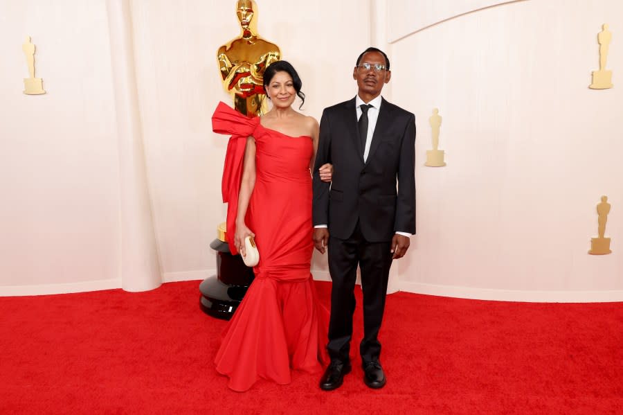 HOLLYWOOD, CALIFORNIA – MARCH 10: (L-R) Nisha Pahuja and guest attend the 96th Annual Academy Awards on March 10, 2024 in Hollywood, California. (Photo by Mike Coppola/Getty Images)