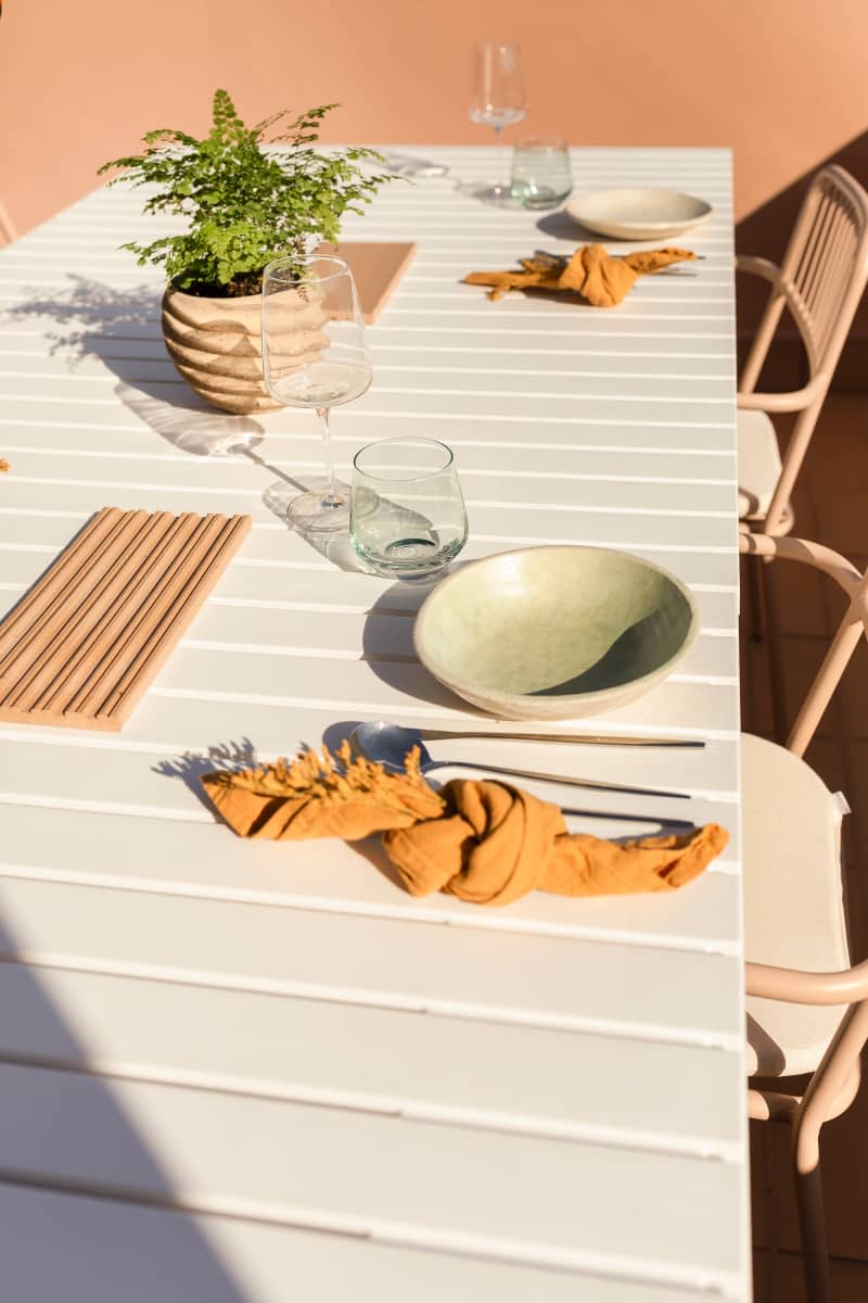 Outdoor table set for dining.