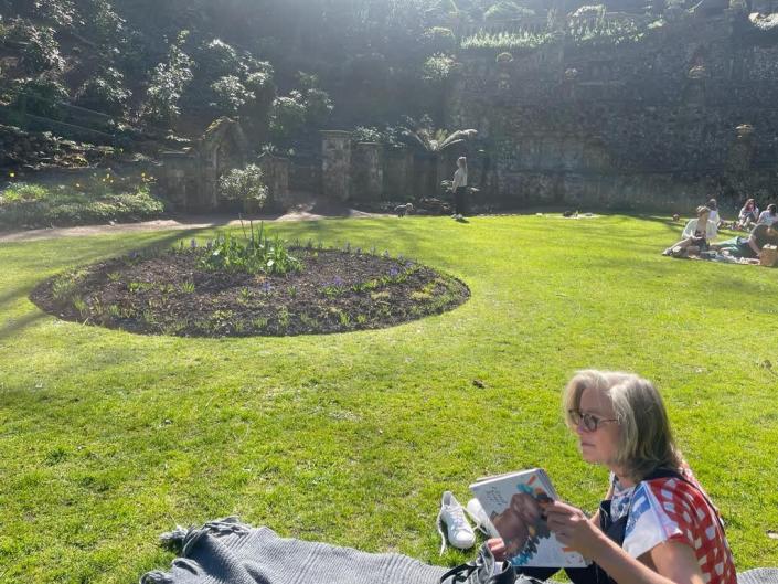 <p>"We decided to spend an afternoon off in the sun and read in a garden."</p>