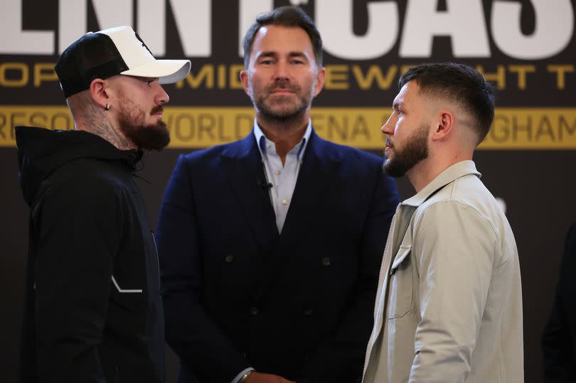 Photo shows Lewis Crocker and Conah Walker with Marchroom Boxing chief Eddie Hearn