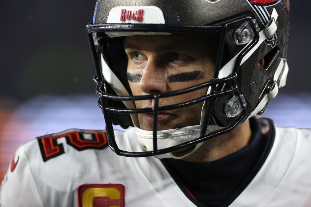 New England Patriots quarterback Mac Jones (10) drops back to pass during  the first half of an NFL football game against the Tampa Bay Buccaneers,  Sunday, Oct. 3, 2021, in Foxborough, Mass. (