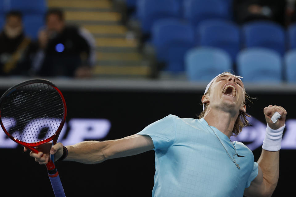 Canada's Denis Shapovalov reacts after defeating Italy's Jannik Sinner during the first round match at the Australian Open tennis championship in Melbourne, Australia, Monday, Feb. 8, 2021. (AP Photo/Rick Rycroft)