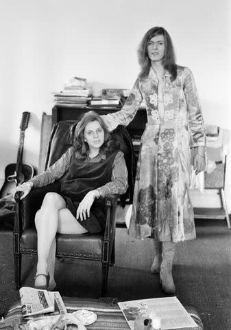 <p>Daily Mirror/Mirrorpix/Mirrorpix via Getty</p> David Bowie and wife Angie at home in Haddon Hall, 1971