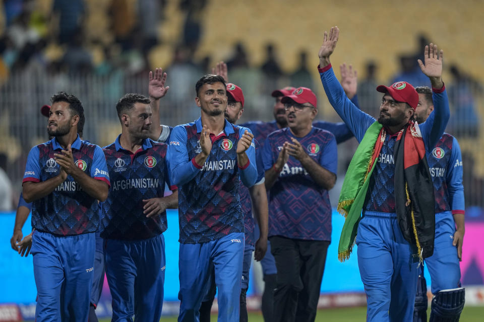 Afghanistan's players acknowledge the crowd after winning their match against Pakistan during the ICC Men's Cricket World Cup in Chennai, India, Monday, Oct. 23, 2023. (AP Photo/Eranga Jayawardena)