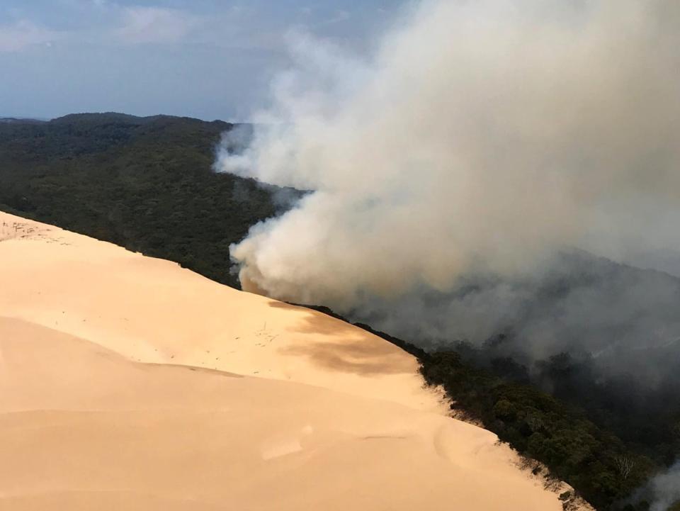 File. In this handout image provided by Queensland Fire and Emergency Services, bushfires continue to burn on 30 November 2020 on Fraser Island, Australia. [Representational]  (QFES via Getty Images)