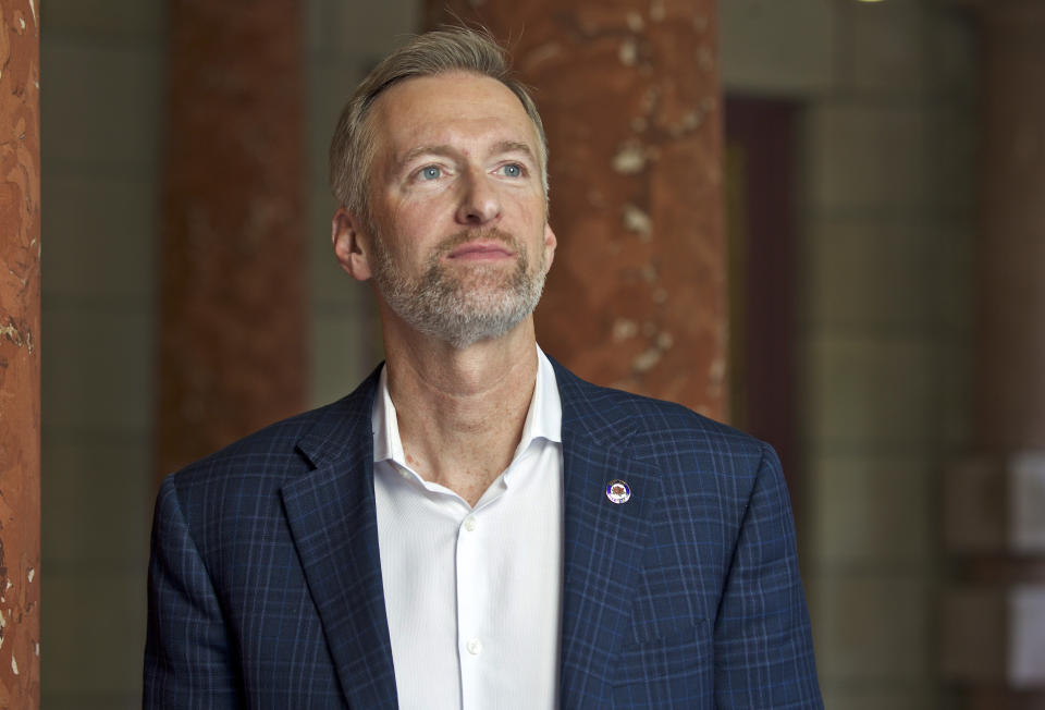 In this Aug. 5, 2019, photo, Portland Mayor Ted Wheeler poses for a photo in Portland, Ore. Portland police are mobilizing in hopes of avoiding clashes between out-of-state hate groups planning a rally Saturday, Aug. 17, 2019, and homegrown anti-fascists who say they’ll come out to oppose them. Wheeler has said he may ask Gov. Kate Brown to call up the Oregon National Guard. (AP Photo/Craig Mitchelldyer)