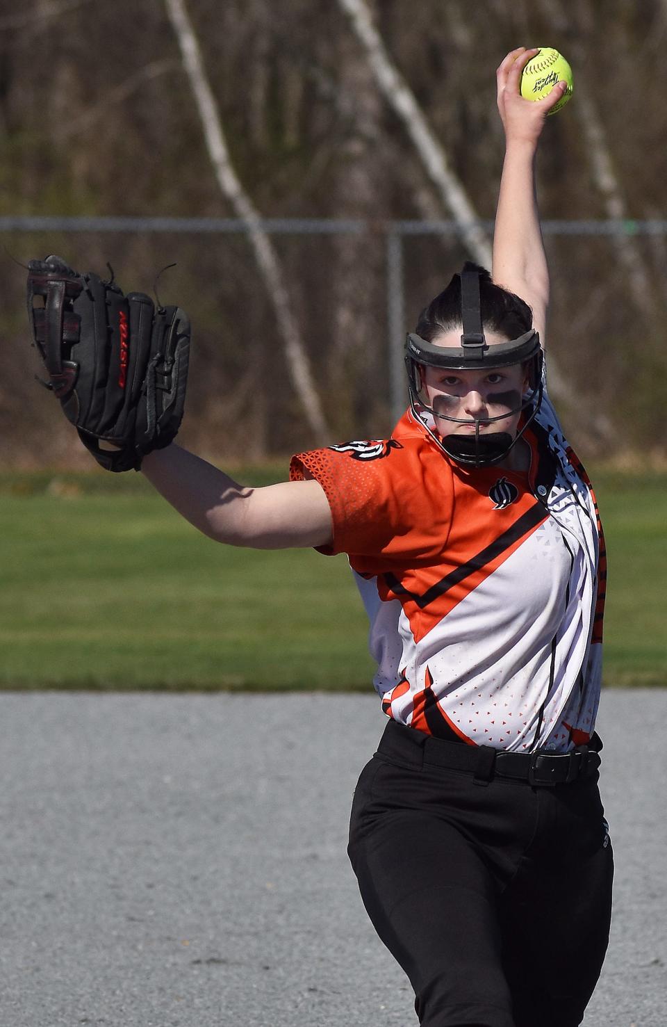 Diman pitcher Ashley Carvalho fires a pitch toward home plate.