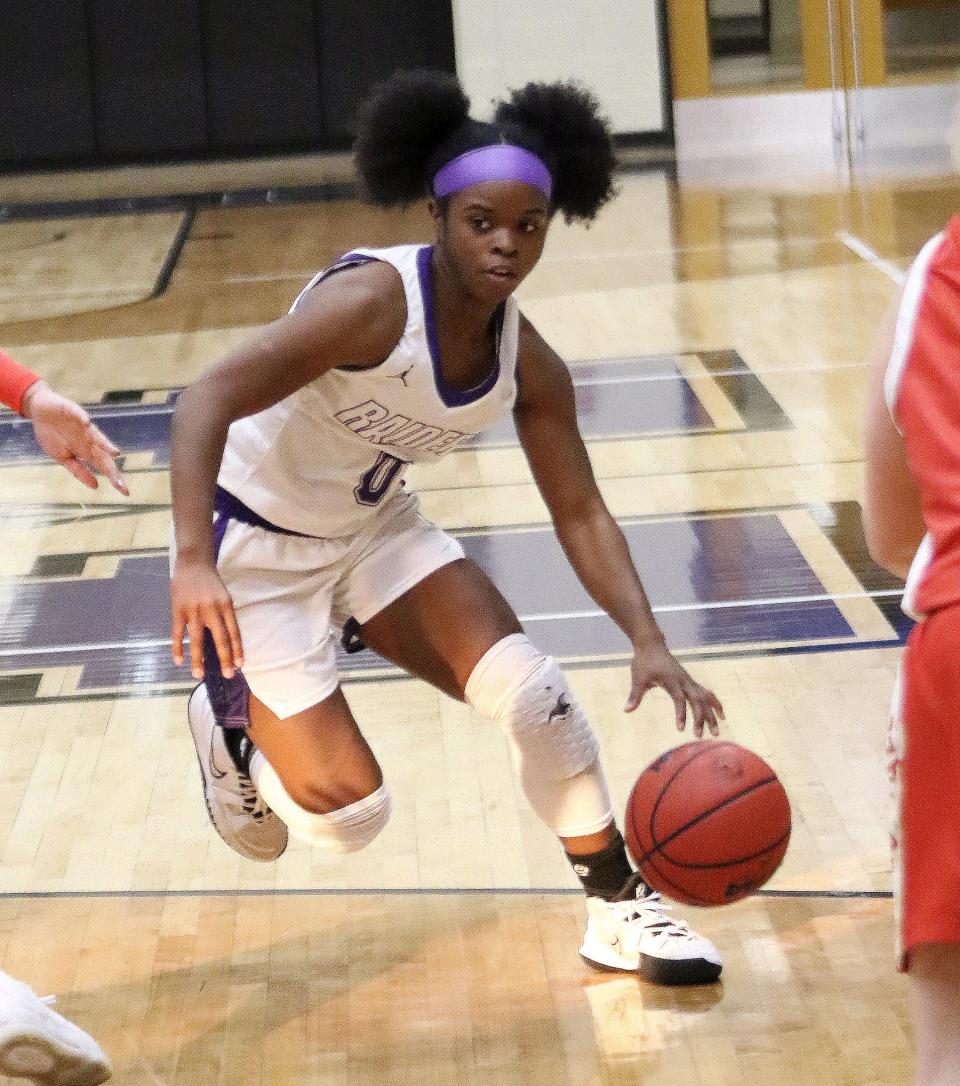 Mount Union's Daveonna Nash drives to the hoop against Otterbein during OAC action at Mount Union Saturday, January 15, 2022.