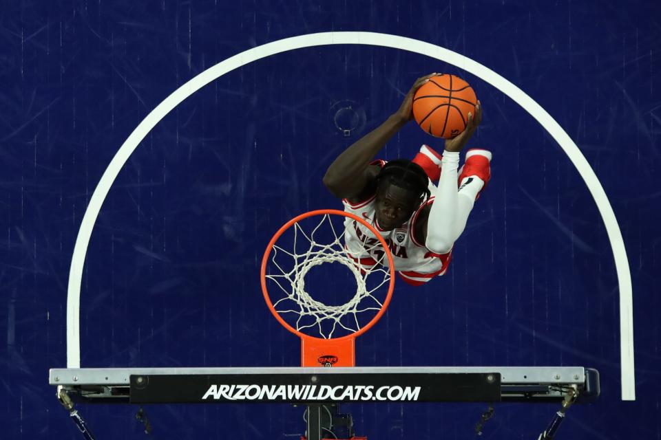 Arizona center Oumar Ballo makes a basket against Wisconsin.